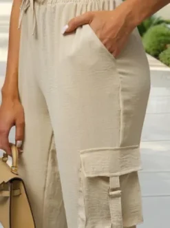 Spodnie damskie joggery jasno-beżowe O/XYS3237^Ozonee Fashion