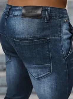 Spodnie jeansowe męskie ciemno-niebieskie NB/MP0091BS^Ozonee Hot