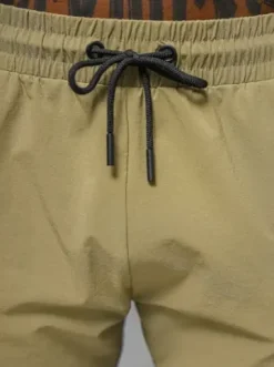 Spodnie męskie chino joggery ciemno-beżowe O/PS5501^Ozonee Discount